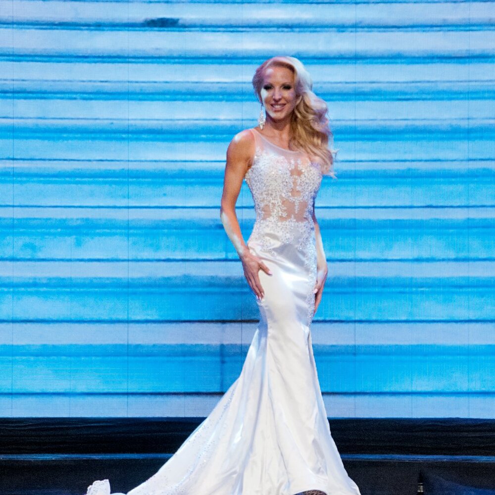 Custom white satin gown with train + lots of crystals and beadwork